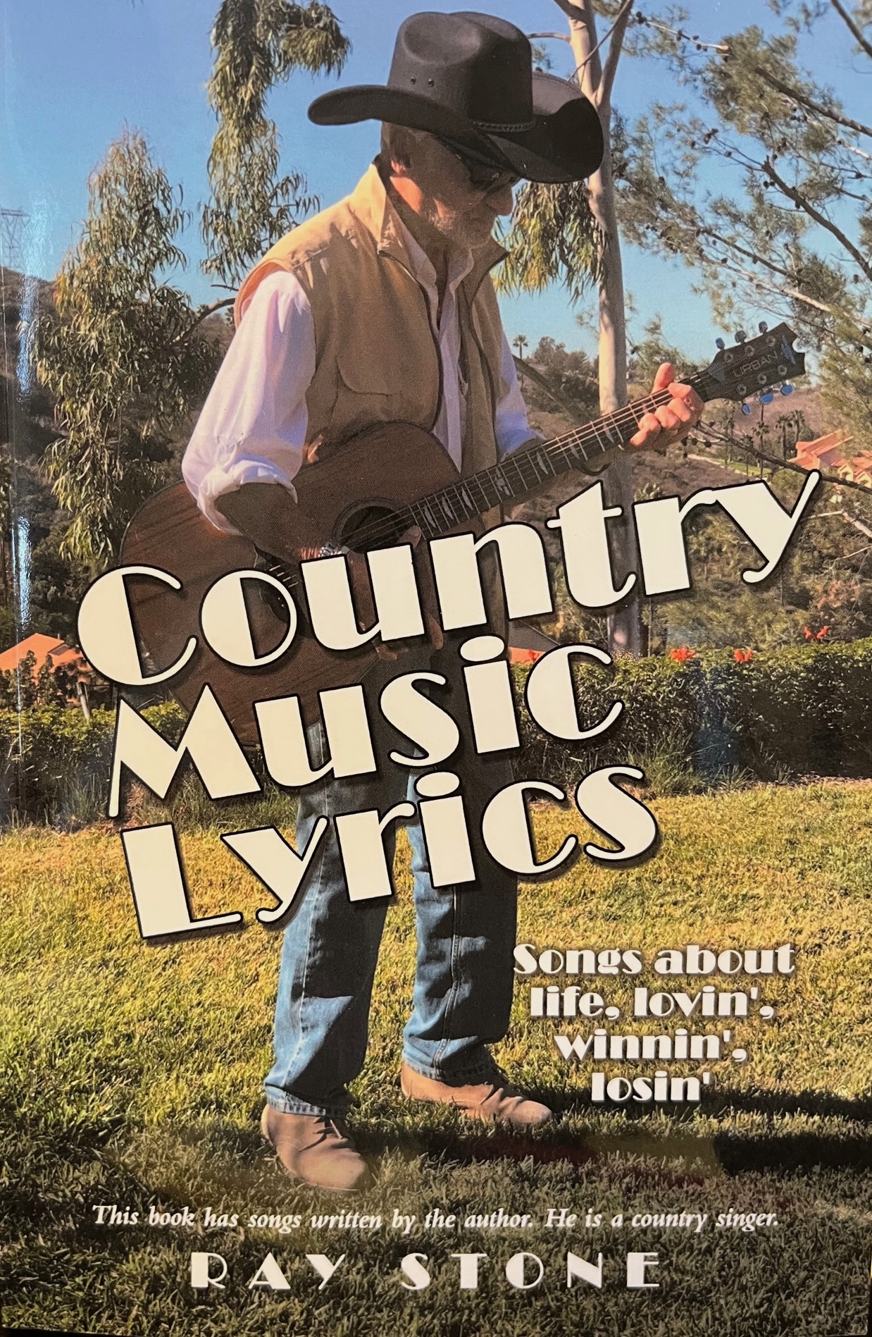 Cover to Country Music Lyrics by Raymond Stone